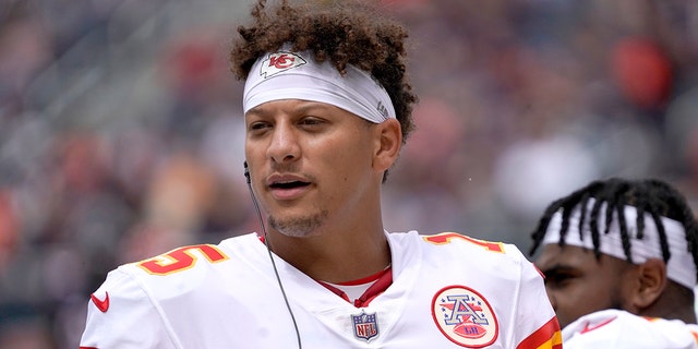 Kansas City Chiefs quarterback Patrick Mahomes is shown listening to the play calls during the first half of an NFL preseason football game against the Chicago Bears Saturday, Aug. 13, 2022, in Chicago.