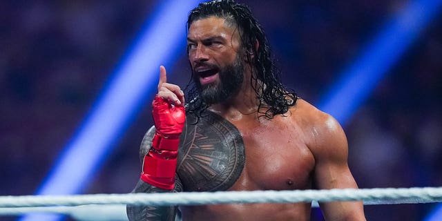 Roman Reigns gestures during the WWE and Universal Championship match at the Alamodome on Jan. 28, 2023, in San Antonio, Texas.