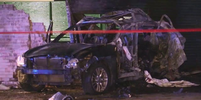 A car caught on fire after police say it crashed into a building while the driver was drag racing in Chicago over the weekend.