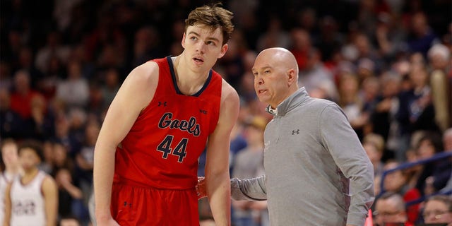 St. Mary's Gaels guard Alex Ducas (44) talks with St. Mary's Gaels head coach Randy Bennett during the game between the St. Mary's Gaels and the Gonzaga Bulldogs on February 25, 2023, at McCarthey Athletic Center in Spokane, WA.
