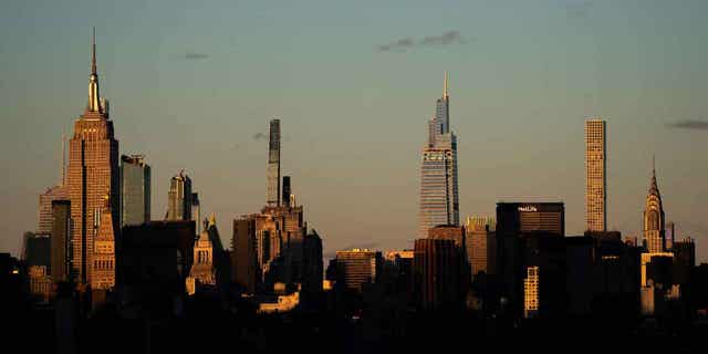 Light falls on the New York skyline during sunset on Nov. 20, 2022. In 2022, Manhattan grew by more than 17,000 residents after losing over 100,000 people in the previous year during the COVID-19 lockdowns.
