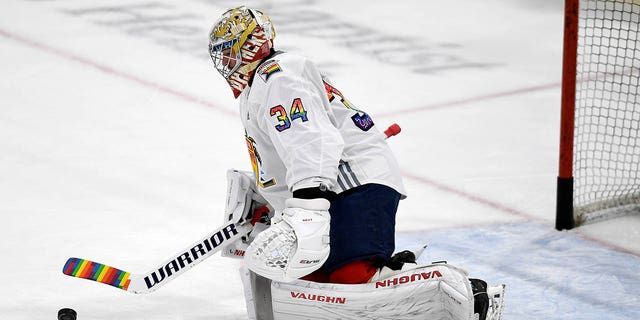 Florida Panthers goaltender Alex Lyon, #34, warms up while wearing a Pride Night hockey jersey before playing the Toronto Maple Leafs, Thursday, March 23, 2023, in Sunrise, Florida.