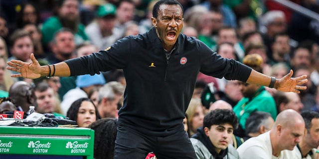 Detroit Pistons head coach Dwane Casey gets in a defensive position on the sidelines. The Boston Celtics beat the Pistons, 127-109. 