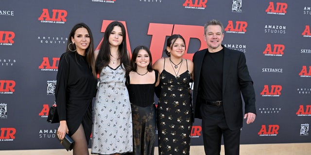 Luciana Barroso, left, and Matt Damon, right, brought three of their four daughters to the premiere of Damon's new movie "Air" Monday night.
