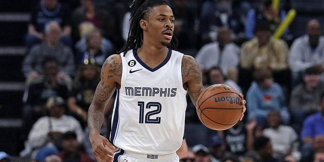 Ja Morant of the Memphis Grizzlies brings the ball up court during a game against the New Orleans Pelicans at FedEx Forum Dec. 31, 2022, in Memphis.