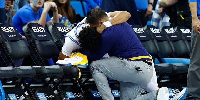 Jaylen Clark #0 of the UCLA Bruins leaves the game with a injury in the second half at UCLA Pauley Pavilion on March 04, 2023 in Los Angeles, California.