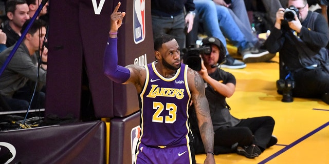 LeBron James of the Lakers scores to pass Michael Jordan and move to No. 4 on the NBA's all-time scoring list during the Denver Nuggets game at Staples Center on March 6, 2019, in Los Angeles.