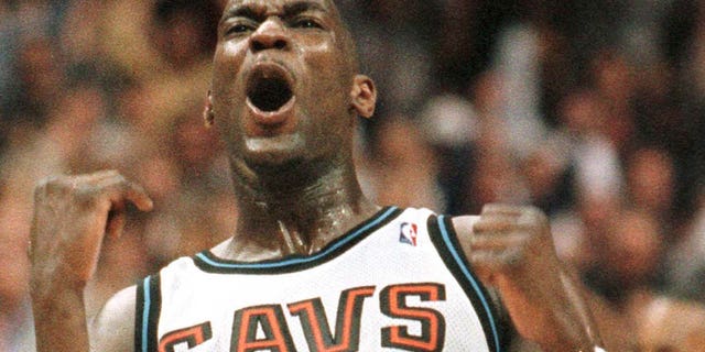 Shawn Kemp, of the Cleveland Cavaliers, reacts after hitting a shot in the fourth quarter of their NBA playoff game against the Indiana Pacers.