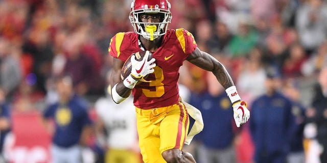 USC Trojans wide receiver Jordan Addison runs after a catch during a game against the Notre Dame Fighting Irish Nov. 26, 2022, at Los Angeles Memorial Coliseum. 