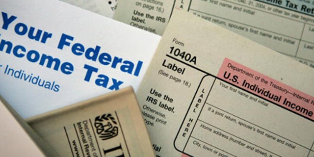 Federal tax forms are distributed at the offices of the Internal Revenue Service in Chicago.