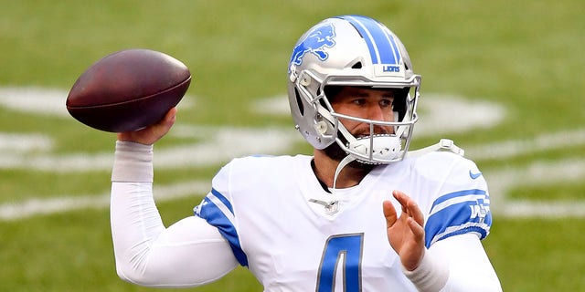 Chase Daniel warms up before a Lions game