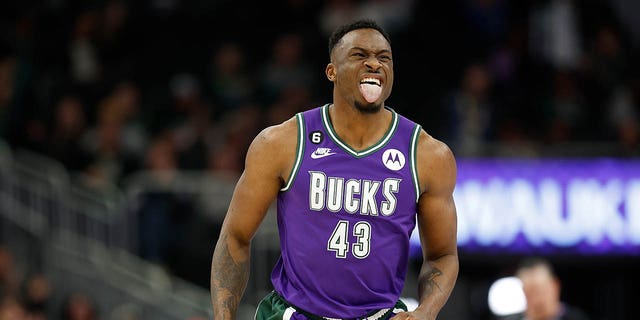 Thanasis Antetokounmpo, #43 of the Milwaukee Bucks, reacts after scoring during the second half of the game against the Miami Heat at Fiserv Forum on February 24, 2023, in Milwaukee, Wisconsin.