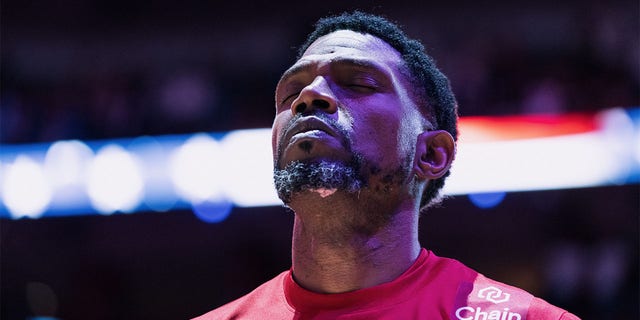 Udonis Haslem stands during the national anthem