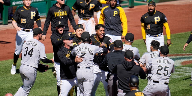 The benches clear as a result of a home plate collision between Pittsburgh Pirates' Oneil Cruz and Chicago White Sox catcher Seby Zavala during the sixth inning of a baseball game in Pittsburgh, Sunday, April 9, 2023. Cruz was injured on the play and helped off the field.