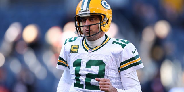 Aaron Rodgers, #12 of the Green Bay Packers, looks on before the game against the Chicago Bears at Soldier Field on December 4, 2022, in Chicago, Illinois.