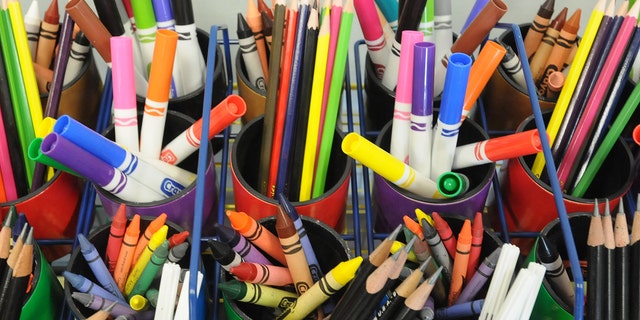 Markers and pencils in a class
