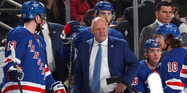 Gerard Gallant looks on during Rangers game
