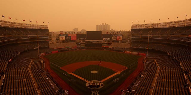 Yankee Stadium covered in smoke