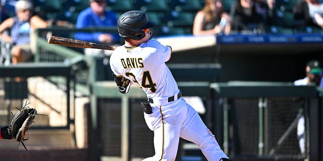 Henry Davis swings bat