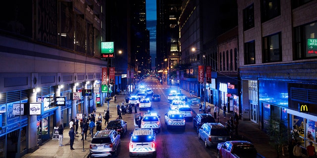Police cars, street lights