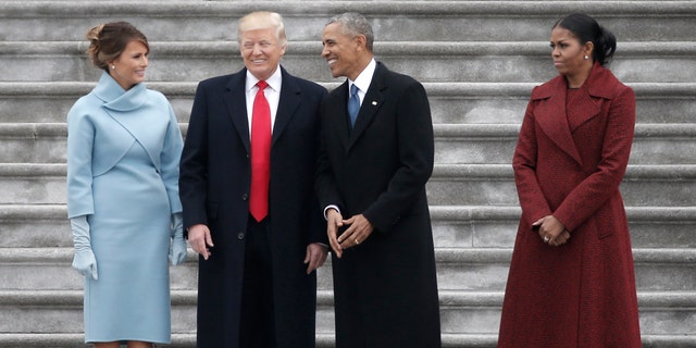 Former president Barack Obama (2nd R) and President Donald Trump share a laugh as former First Lady Michelle Obama (R) and Melania Trump look on following inauguration ceremonies swearing in Trump as the 45th president of the United States on the West front of the U.S. Capitol in Washington, U.S., January 20, 2017. REUTERS/Mike Segar - RTSWJBX