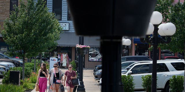 People walk through Tennessee town square
