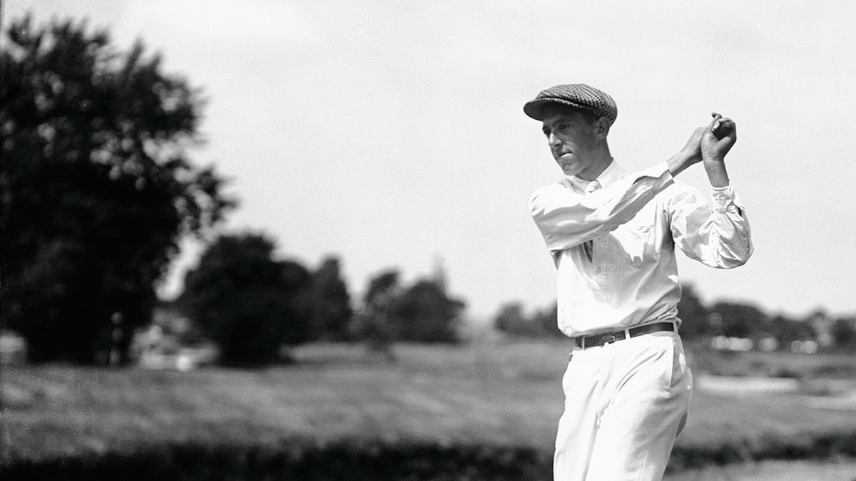 Francis Ouimet plays golf