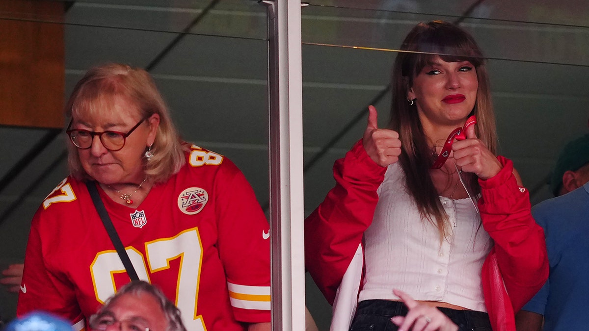 Taylor Swift wears red Chiefs jacket at Kansas City football game