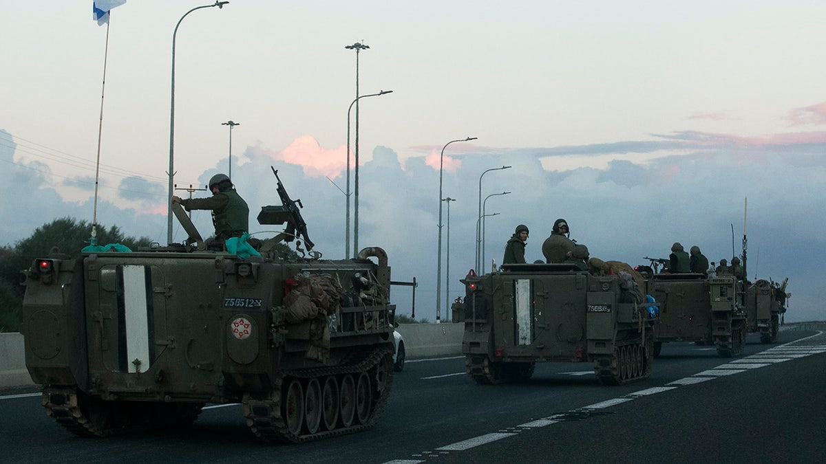 Israeli tanks move by Lebanon