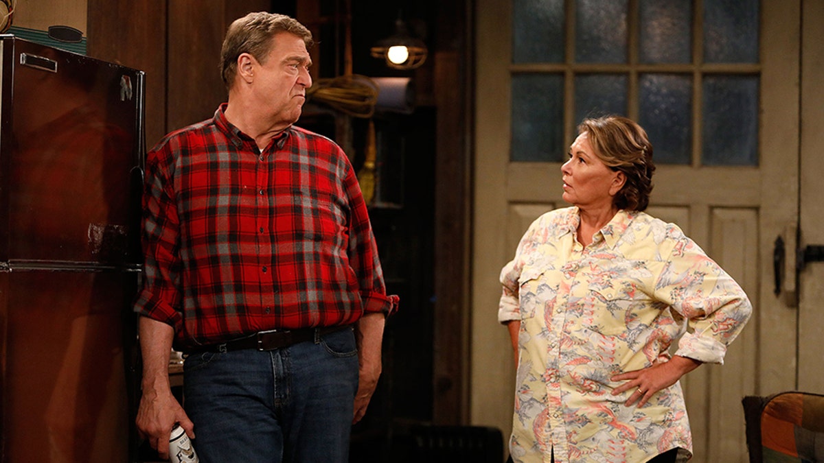 ROSEANNE - "Twenty Years to Life" - Roseanne and Dan adjust to living under the same roof with Darlene and her two children, Harris and Mark, when Darlene loses her job. Meanwhile, Becky announces she is going to be a surrogate to make extra money; and Roseanne and Jackie are at odds with one another, on the season premiere and first episode of the revival of "Roseanne," TUESDAY, MARCH 27 (8:00-8:30 p.m. EDT), on The ABC Television Network. (ABC/Adam Rose)JOHN GOODMAN, ROSEANNE BARR