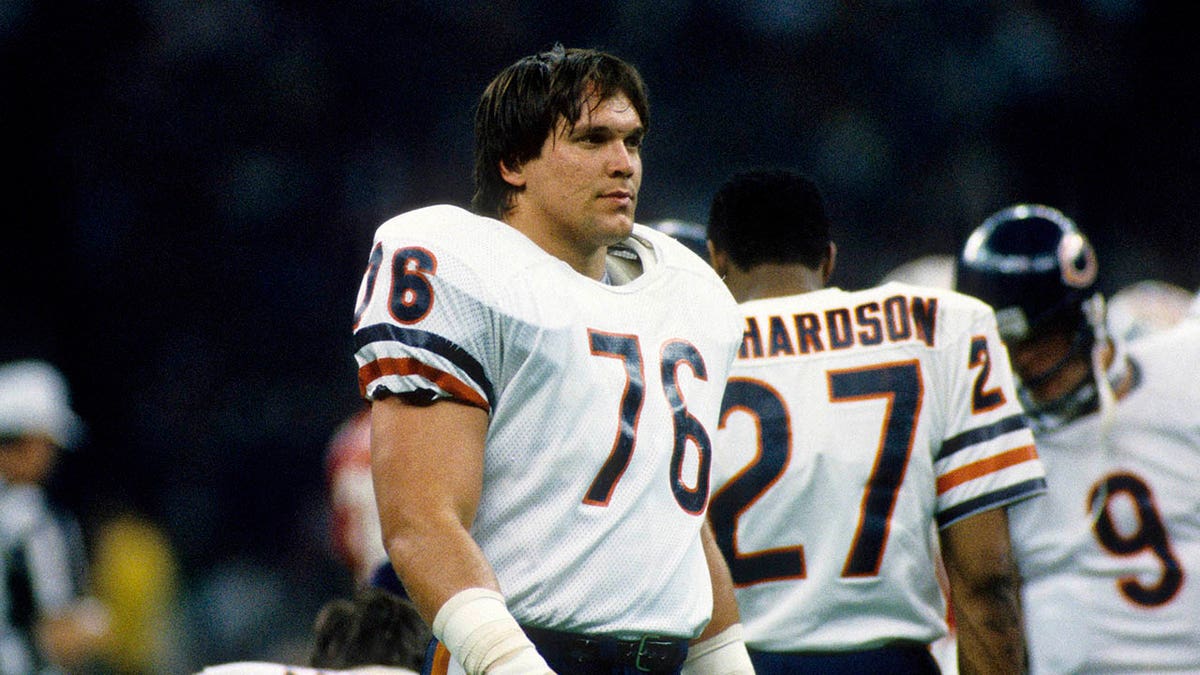 Steve McMichael on the football field during a game