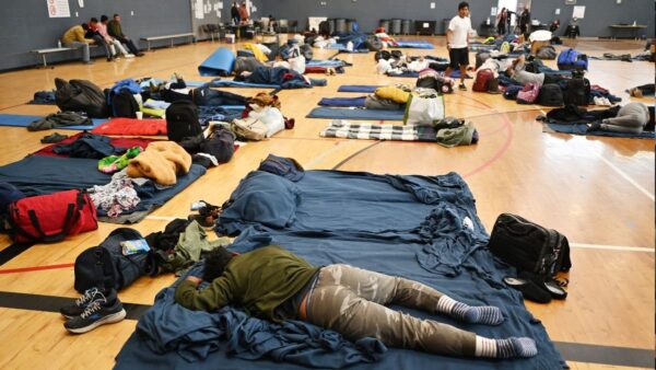 Hundreds of migrants being evicted from Denver shelters as city funding dries up