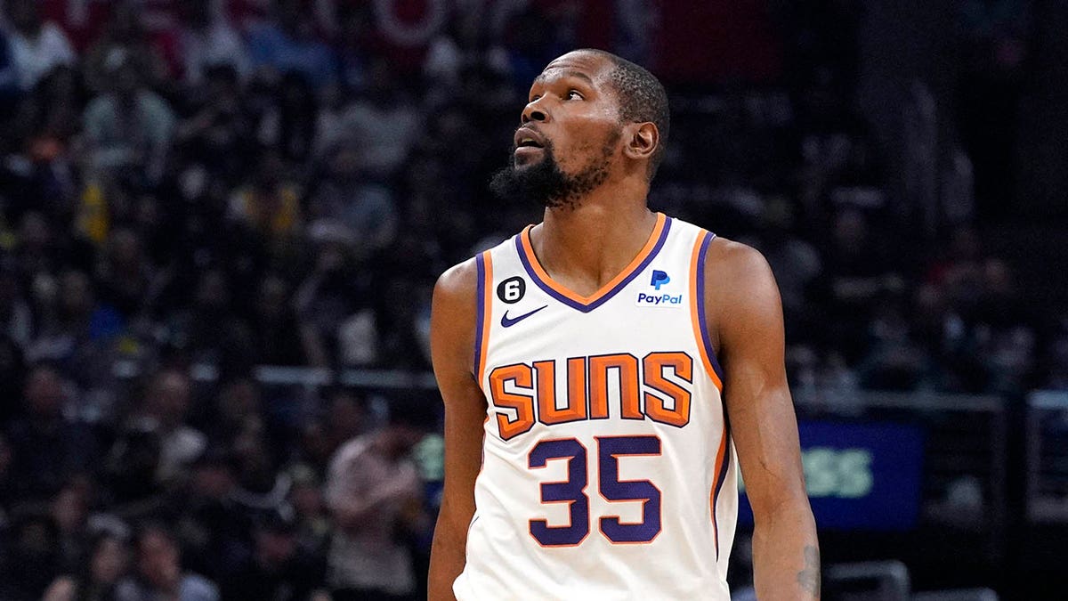 Kevin Durant stands on the basketball court