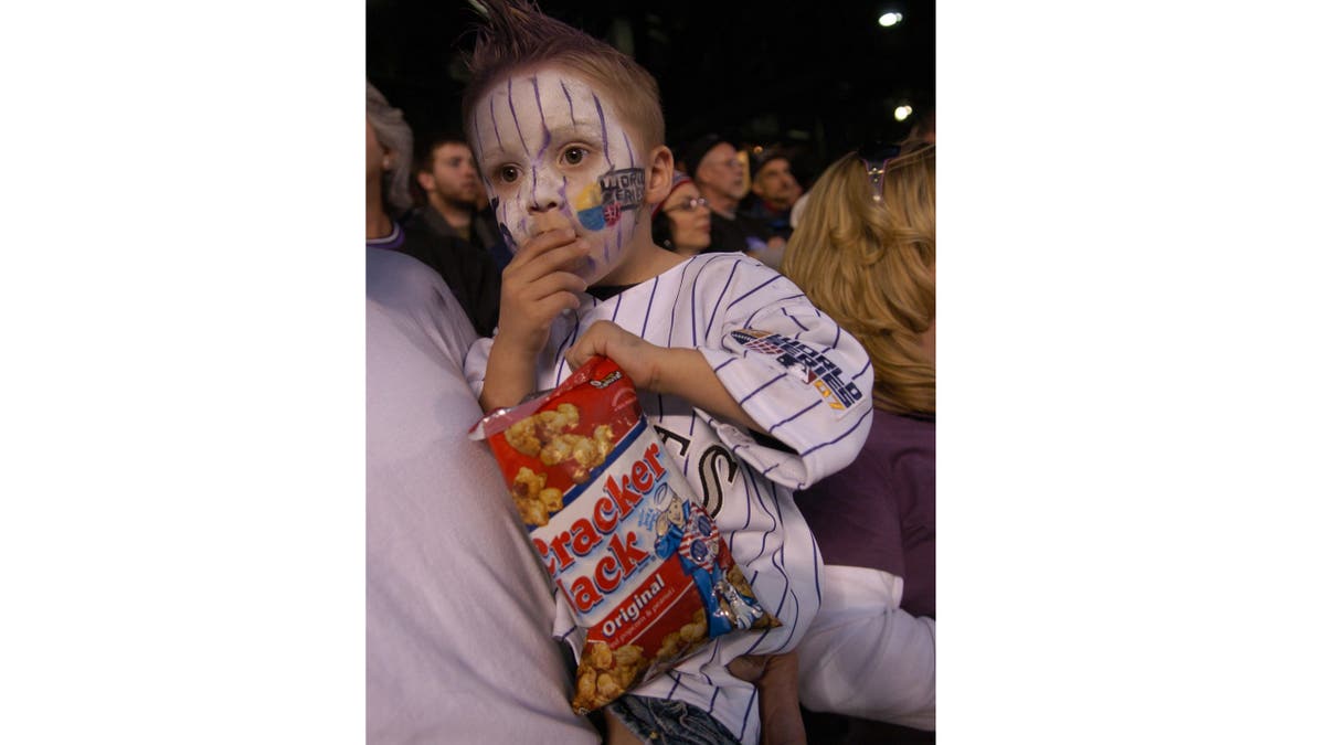 Child eating Cracker Jack