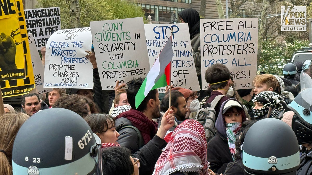Pro-Palestinian protesters demonstrate along NYPD police lines outside of Columbia University’s campus