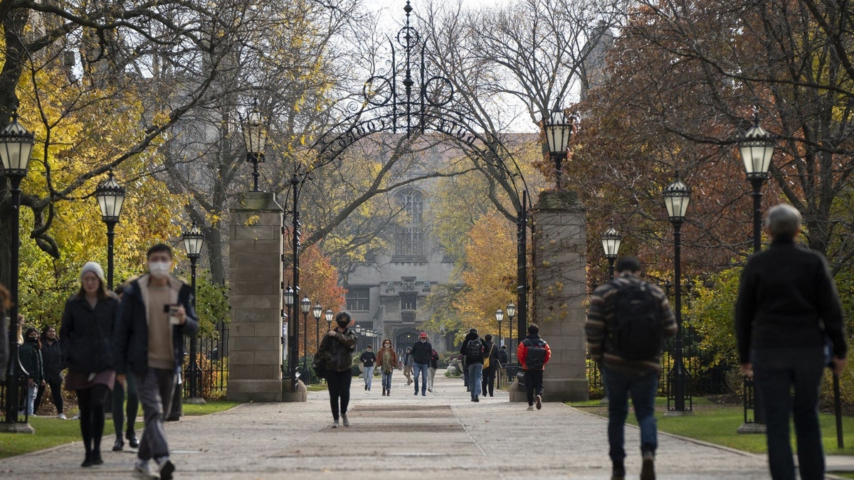 Students walk on the University of Chicago campus