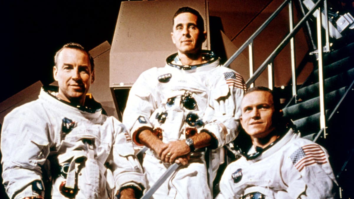 Portrait of the crew of NASA's Apollo 8, Florida, December 1968, including command module pilot James Lovell, left, lunar module pilot William Anders, and Commander Frank Borman.