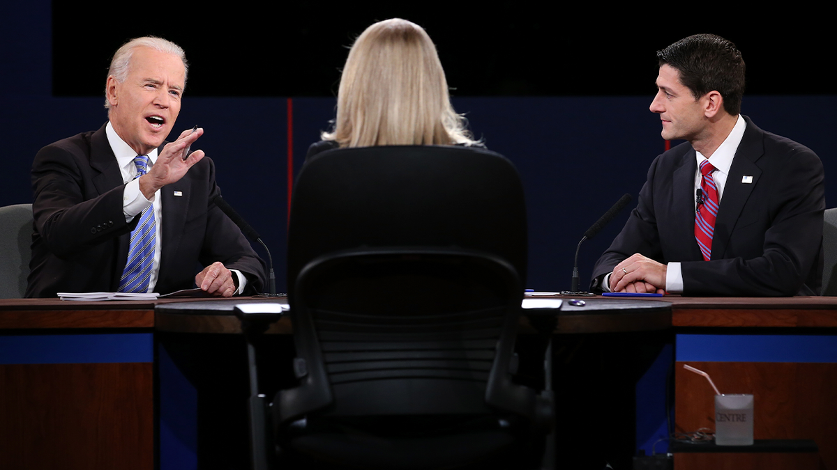 Joe Biden during VP debate in 2012 with Paul Ryan at right